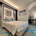 Domos & 4* Porto Pino