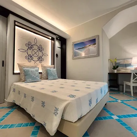 Domos & 4* Porto Pino